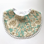 green flower bib