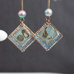 冬のにゃんこピアス