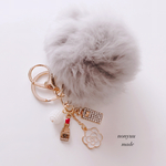 new✨リアル ファーとおしゃれなキーリング付きバッグ チャーム✨香水 パール カメリア リップ