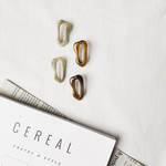 deformed acrylic frame earring