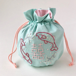 手刺繍丸底巾着ポーチ「ダブルハピネス」