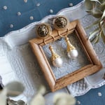 vintage✳︎ライオンとパコットンールのピアス・イヤリング・ノンホールピアス/金属アレルギー対応