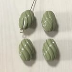 VINTAGE OLIVE GREEN TWESTED OVAL BEADS