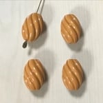 VINTAGE CAMEL TWESTED OVAL BEADS