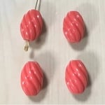 VINTAGE CHORAL ORANGE TWESTED OVAL BEADS