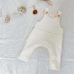 縄編みキルトのふわふわニットサロペット