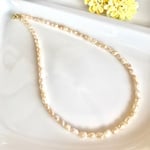 オレンジのライスバロック型淡水パールのネックレス
