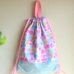 お着替え入れ　大きめ　リボンちょうちょ×スカラップ  女の子 