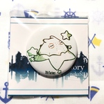 ロゴ風缶バッジ「星メンダコ」