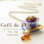 Café de KU:天然琥珀）ティーカップネックレス