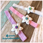 真っ白なお花とオーロラパーツのヘアバンド