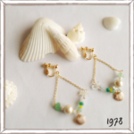 夏の風に揺れるイヤリング