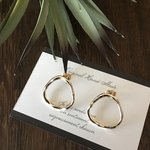 gold hoop pierce