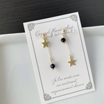 紫金石と星のアシンメトリーなイヤリング