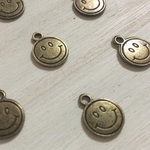 チベタンシルバー スマイル チャームGD 薄め10個セット