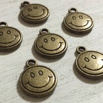 チベタンシルバー スマイル チャーム 金古美 8個セット