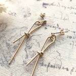 a tight knot イヤリング/ピアス