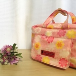 【3/16販売】蓋つき・手提げポーチ（おむつポーチ）ピンク×黄色花柄