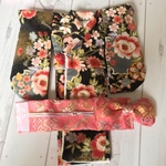 黒着物と桃色帯