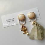 一点物✴︎アンティークボタンのピアス pinkbeige