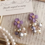《送料無料》大ぶり♥パープルFlower♥じゃらじゃらピアス