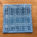 庄内刺し子のコースター （水色  花十字刺し）