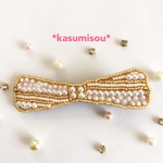 キラキラビジューのリボン型ヘアクリップ