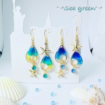 ～Sea green～海の欠片(雫タイプ)  イヤリング可 樹脂ピアス 樹脂ノンホール 海 海の日 波 夏 パール 浜辺 ビーチ ヒトデ 深海  アシンメトリー 青 緑