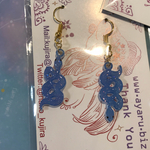 青色の蛇のピアス