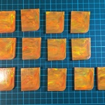 人工オパール　オーロラ オレンジ赤斑　約９グラム原石