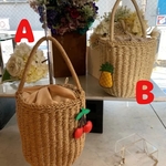 🍍筒型かごバッグ　チャーム付き🍒