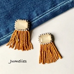 square with fringe / beige