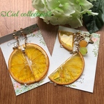 半カットオレンジ ジューシー大ぶりピアス🍋