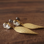 swarovski × stardust leaf pierces