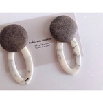 khaki leather × white marble