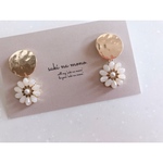 gold circle × white flower pierce