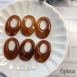 【6個入】マーブルレトロオーバルチャーム 琥珀 33×23mm【0079】