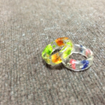 かすみ草に包まれる2色リング