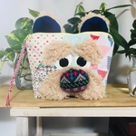 クマのような犬のような困ったさん顔の個性的パッチワークポーチ