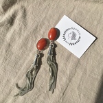 【red jasper . silver . tassel】