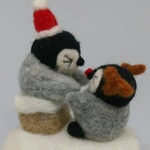 クリスマス 煙突にハマったペンギン君