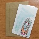 原画・猫のぬいぐるみの耳をガジガジ
