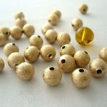 ビーズクラブ メタルビーズ ロンデル★ボール★金艶消し★50個★8mm[4582434304269]