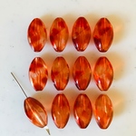 Clear Orange Marble Twisted Oval Beads