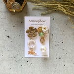 ピアス⭐︎フラワーボタンパールチャームme