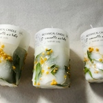 emboss botanical candle