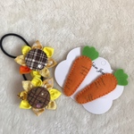 ニンジンのパッチンピン➕花のヘアゴムのセット