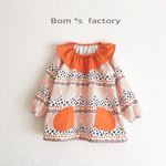 [特集掲載]北欧風幾何学のひらひらフリルスモック(オレンジ色)＊110サイズ