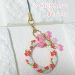 お花のチューブクロッシェのキーホルダー（オレンジ）