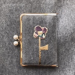 patch “002”  がま口マルチケース　しおり付き